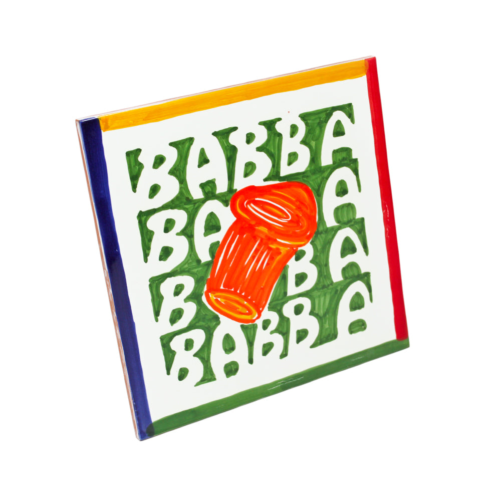 Maiolica napoletana artigianale dipinta a mano con pattern colorato di baba su sfondo verde decorazione ceramica unica